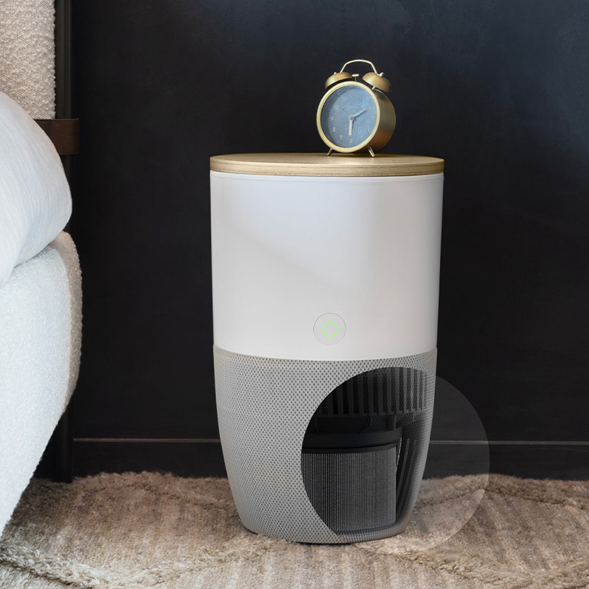 Bloom air purifier with oak top as a bedside table, with a view of the filter at the base
