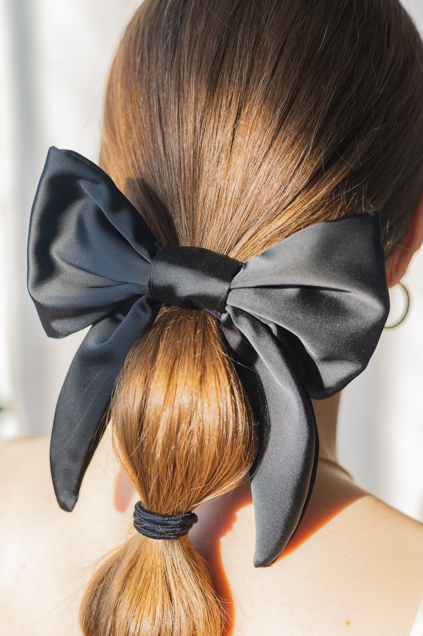 Boucle sophistiquée en satin certifié