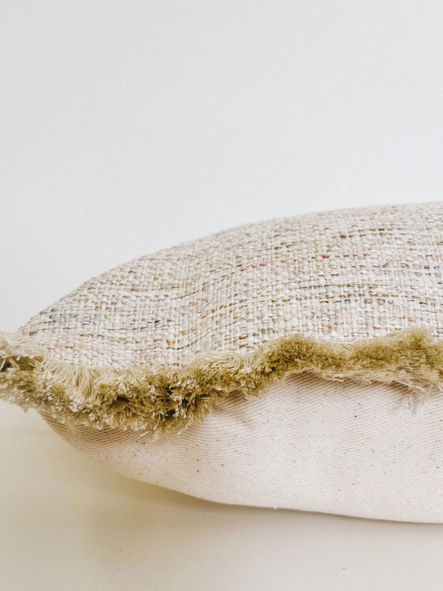 Housse de coussin Constance | Lissage coloré à franges