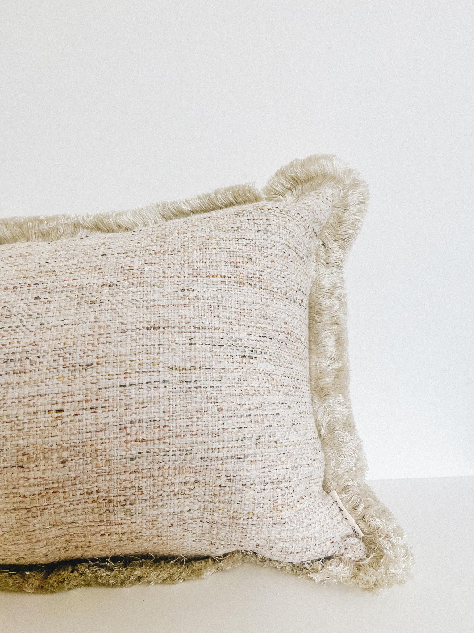 Housse de coussin Constance | Lissage coloré à franges
