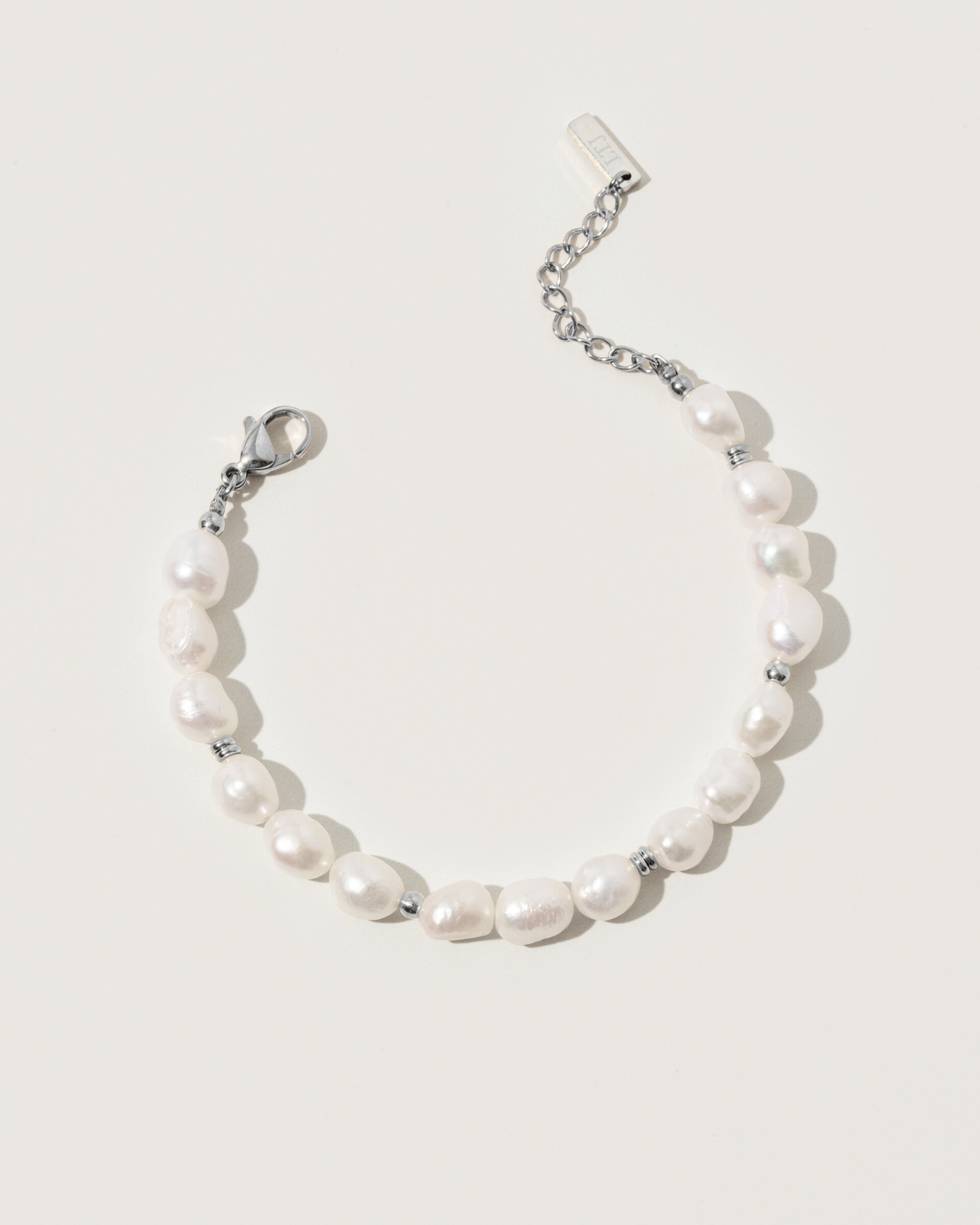 Bracelet soleil perles d'eau douce - Textures