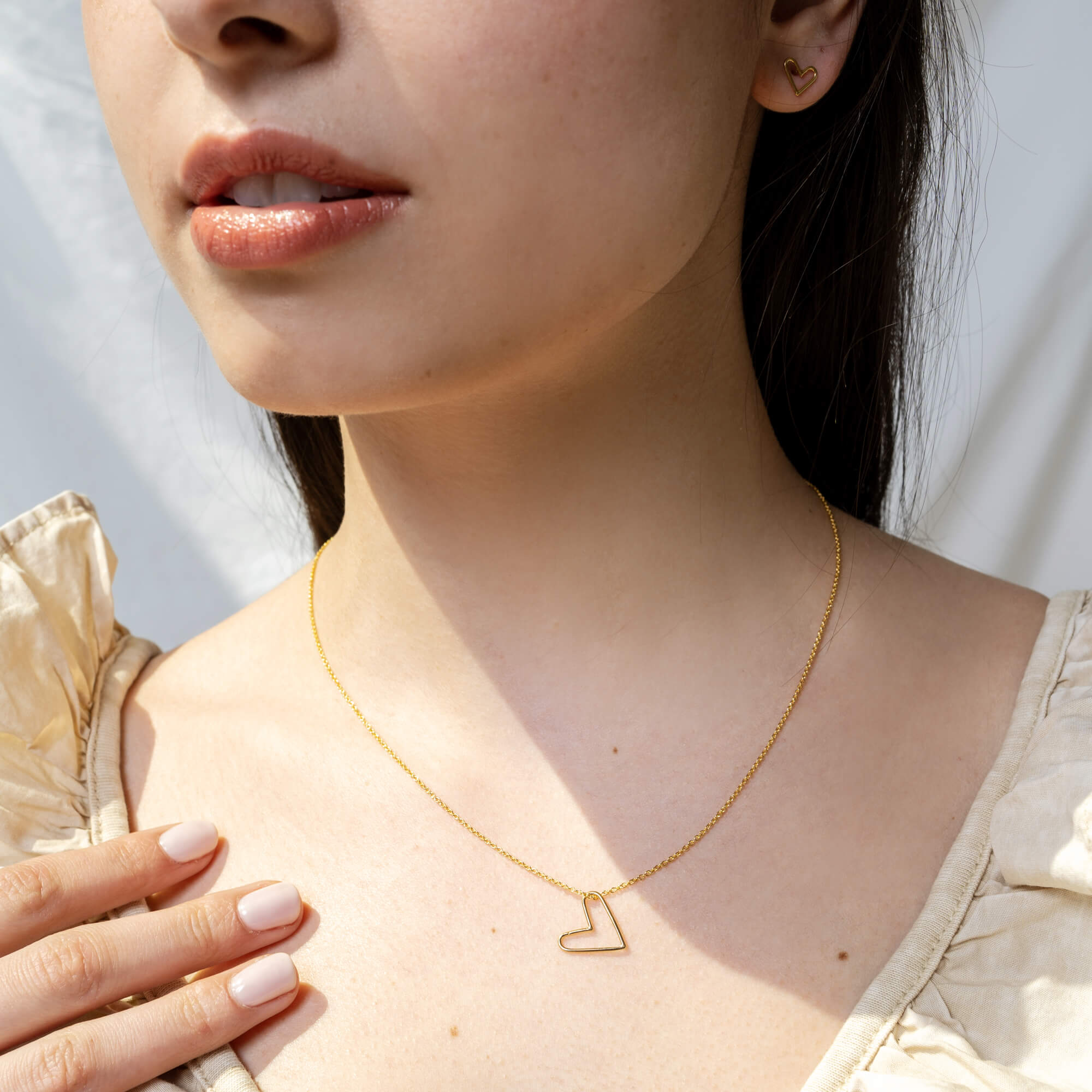 Collier avec pendentif minimaliste en forme de coeur