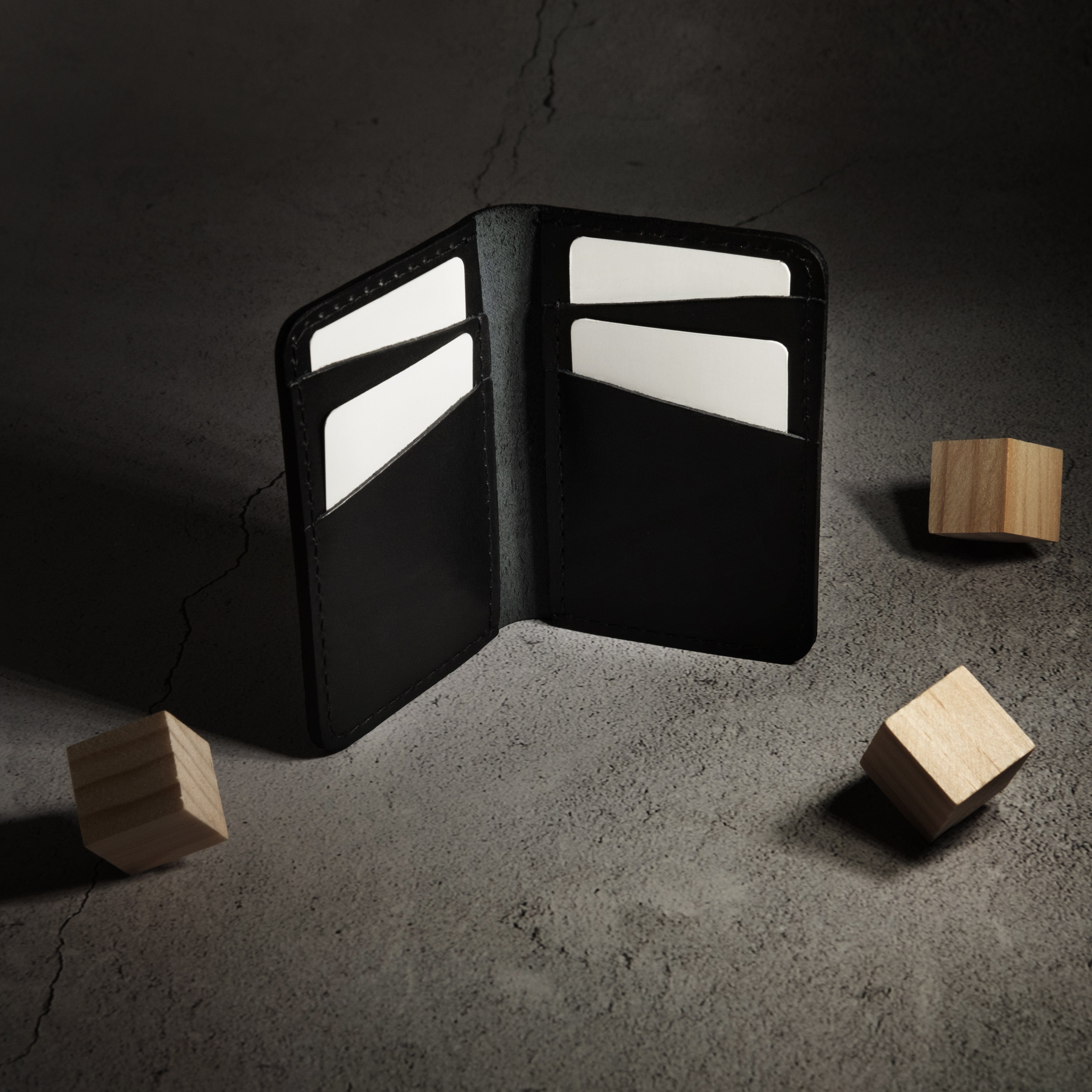 Portefeuille vertical en cuir noir